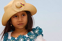 Young girl in traditional dress with straw hat, Montecristi, Ecuador 2004