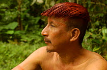 Colorado indian man with hair dyed with Achiote seeds, Ecuador, Santo Domingo de Los Colorados