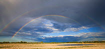 Double rainbow at Klein Namutoni waterhole, Etosha NP, Namibia