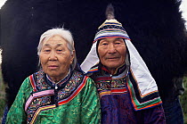 Udege couple in national dress, Primorskiy, Siberia, Russia  (Ussuriland).