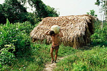 Thatched hut for smoking latex and extracting rubber ball, Acre, Brazil
