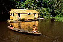 Houseboat made of palm leaves Piagacu Purus Sustainable Devt Reserve, Amazonas, Brazil