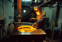 Foundry heating gold to make gold bars, Fazenda Brasileiro, Bahia, Brazil Vale do Rio Doce company