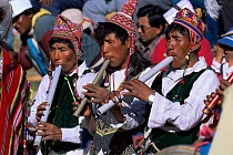 Quechua musicians play wind instruments at festival, La Paz, Bolivia