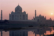 Taj Mahal at sunset on banks of Yamuna river, Agra, Uttar Pradesh, India