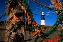 Fishermen's ropes and Spurn point lighthouse, East Yorkshire, UK