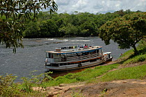 Passenger boat on the Cachoeira de Maro river, Para State, Brazil.