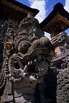Stone dragon sculpture in a temple in Ubud. Bali, Indonesia.