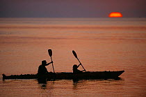 Kayaking in the Bohuslan archipelago at sunset. Sweden