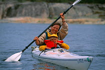 Mother and child kayaking, Mja, Stockholm archipelago, Sweden.