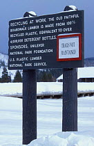 Sign at Old Faithful, relating to use of recycled materials, Yellowstone National Park, USA.