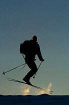 Cross country skiing jumping, ecotourism, Grovelsjon NR, Dalarna, Sweden.