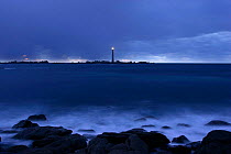 The Lighthouse La Vieille at night in front of the Pointe du Raz, Brittany, France.