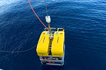 ROV (remotely operated vehicle) Oceanographic sampling gear being launched from deep sea research boat, GO Sars