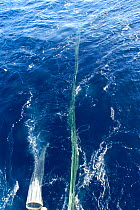 Releasing deep sea marine sampling equipment  from aft deck of GO Sars, Atlantic ocean