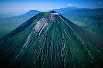 Aerial view of Ol Doinyo Lengai  (The Mountain of God) Volcano, Rift Valley, Tanzania. Note- light gray flows known as 'squeeze-ups' from the highly fluid lava, still active.
