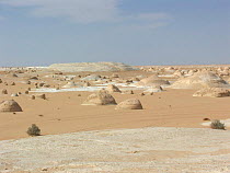 The White Desert, Western Desert, Egypt, with rock formations caused by wind erosion.