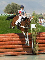 Philippa Funnell of Great Britain, going over cross country jump, Olympic Games, Athens, Greece. 2004