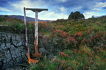 Turf spades for cutting peat in bog, Highlands, Scotland, UK.