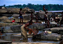 The Waregia tribe doing their daily washing on the rapids outside Kisangane, Democratic Republic of Congo.
