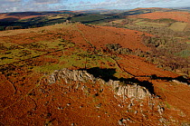 Aerial view of Great Tor Rock with views of Hound Tor in the background. Dartmoor National Park, Devon, UK