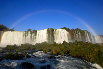 Rainbow in spray over Iguassu Falls, Parana state, Brazil.