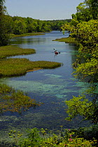 Canoeist on Rainbow River, Rainbow Springs State Park, Florida, USA