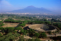 Roman amphitheatre at Pompeii with Mount Vesuvius in the background, Southern Italy.