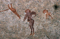 Rock art / cave paintings, hunter with prey, Namibia.