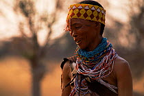 Jo / Hoan bushman with traditional beaded headdress and jewellry, Bushmanland, Namibia. 1996