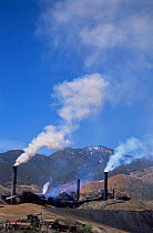 Copper smelter industry, sending pollution up into air, Sonora Desert, Mexico, Central America