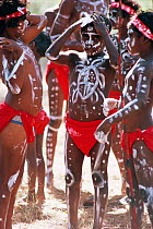Children in traditional paint markings and clothing, Aboriginal dancers, Australia