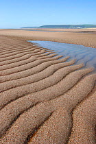Patterns in sand at low tide, Saunton Sands, Devon, UK.