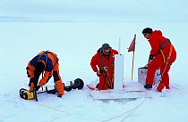 Researchers install "iceberg transmitter" to measure the drift of the iceberg via satellite. ISPOL (ICE Station Polarstern) Expedition 2004/2005 from Alfred Wegener Institute, Bremerhaven, Germany. Th...