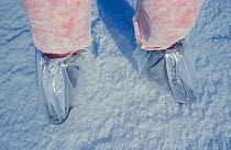 Researchers wearing protective foot coverings to prevent contamination of the ice. (ISPOL (ICE Station Polarstern) Expedition 2004/2005 from Alfred Wegener Institute, Bremerhaven, Germany. The Icebrea...