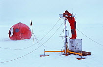 Researcher measuring air turbulence. ISPOL (ICE Station Polarstern) Expedition 2004/2005 from Alfred Wegener Institute, Bremerhaven, Germany. The Icebreaker Polarstern was drifting for five weeks with...