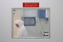 Researcher Delphine Lannuzel working in laboratory - a sterilized-container on board ship, ISPOL (ICE Station Polarstern) Expedition 2004/2005 from Alfred Wegener Institute, Bremerhaven, Germany. The...