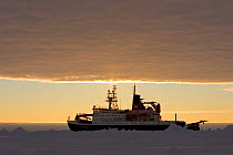 Icebreaker research ship, Polarstern, moored on ice floe, photographed at 03:00 am. Weddell Sea, Antarctica (Image not available for advertising use)