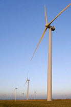 Wind farm turbines against blue sky, Los Monegros, Spain