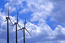 Wind farm turbines against cloudy sky, Los Monegros, Spain