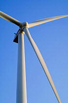 Wind farm turbine against blue sky, Los Monegros, Spain
