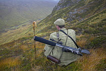 Innes MacNeill, head ranger, Alladale Wilderness Reserve looking out over Glen More during October hind stalking, Alladale, Scotland, UK, 2005