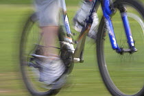 Close up section of mountain biker in action, Sutherland, Scotland, UK 2006
