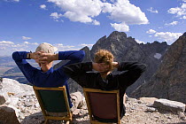 Climbers relaxing at base camp in preparation for a climbing Grand Teton, Grand Teton National Park, Wyoming, USA