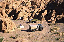 Paleontologists on research expedition camping at Khermiyn-Tsav canyon, Gobi Desert, Mongolia, Central Asia