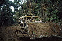 Bulldozer clearing rainforest for timber of Okoume tree {Aucoumea klaineana Pierre} Equatorial Guinea, Central Africa 1999