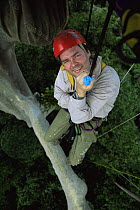 Huw Cordey, producer of Jungles episode, BBC Planet Earth series, up in canopy of rainforest tree, Costa Rica, 2005.