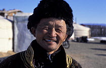 Portrait of nomadic tribesman from Gobi desert, living in traditional yurts, Mongolia. January 2004. Filmed for BBC Planet Earth series.