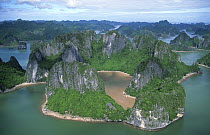 Aerial view of limestone island formations in Ha Long Bay, Vietnam, 2005. Filmed for BBC Planet Earth series.