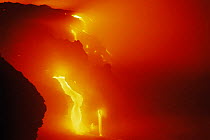 Lava flowing from Lae'apuki bench into the sea during Pu'u O'o eruption, Kilauea Volcano, Hawaii, Jan 2000